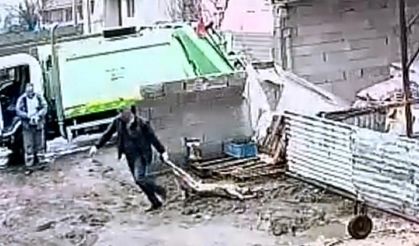 Köpeği sürükleyip çöp kamyonuna attı!